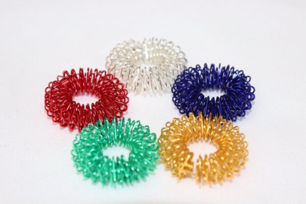 accupressure ring in assorted colors